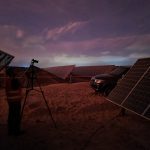 Night EL-photography of already installed solar panels. A diesel generator on the truck powered the solar panels to make them emit light during photography.