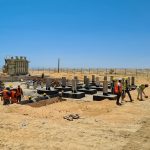 Ground works for the transformer and E-house (electronics house) being carried out. Inspection of grounding cable connections.